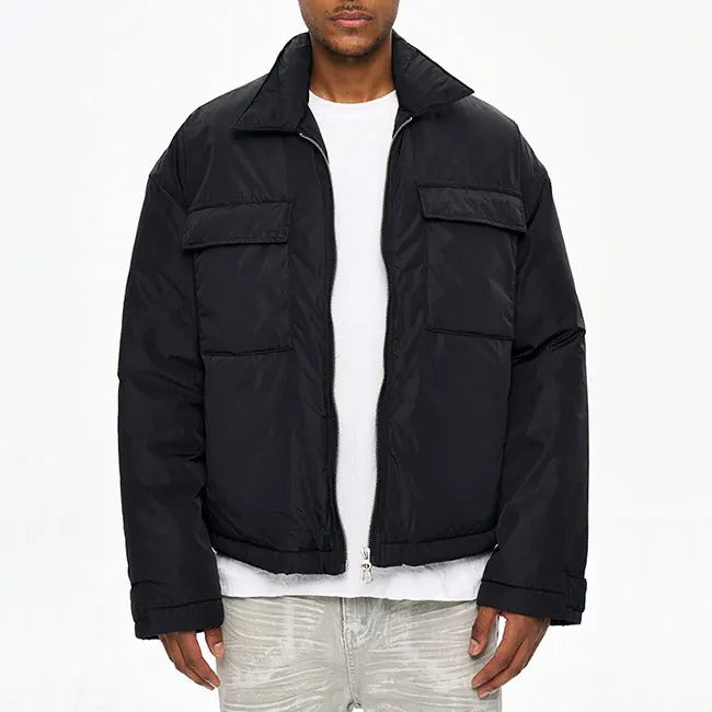 Veste noire matelassée avec col classique et zip