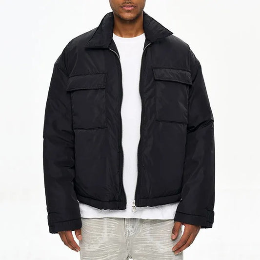 Veste noire matelassée avec col classique et zip