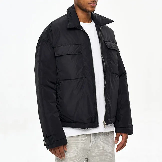 Veste noire matelassée avec col classique et zip