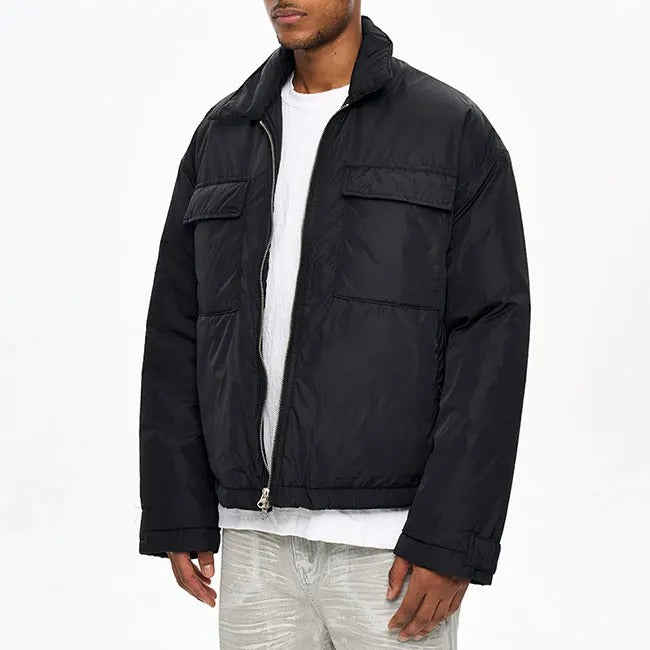 Veste noire matelassée avec col classique et zip