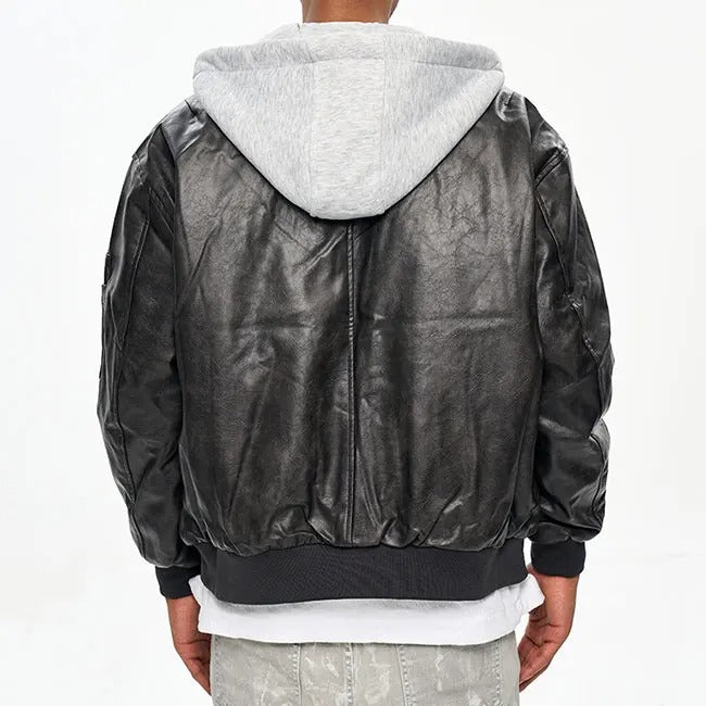 Veste noire avec capuche grise et fermeture zippée